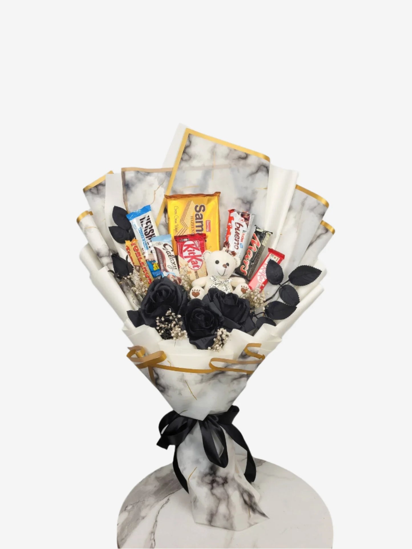 Bouquet of snacks and candies wrapped in marble paper with a white background. Send flowers to lahore. send flowers to Pakistan