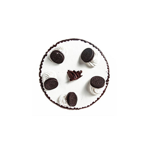 Round cake with white frosting, chocolate cookies, and a chocolate piece on a white background . Send flowers to islamabad. send flowers to pakistan