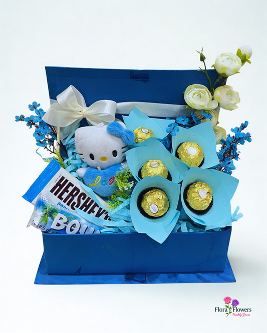 Gift basket with Hello Kitty plush toy, flowers, and chocolate bars on a white background