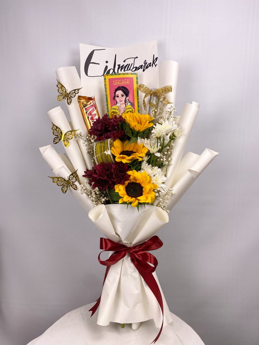 Bouquet with flowers, ribbons, and a card on a white background