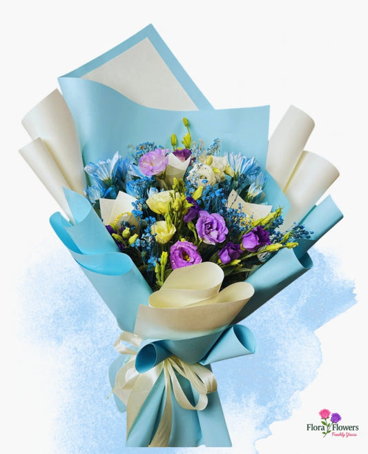Bouquet of flowers wrapped in blue paper with a white ribbon on a light blue background